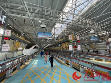 探访动车“4S店”：智能检测机器人“把脉”京张高铁