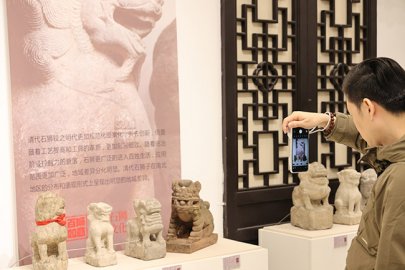 古代石狮民俗文化展在西城区文化馆开幕